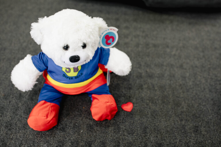 Business with a heart teddy.